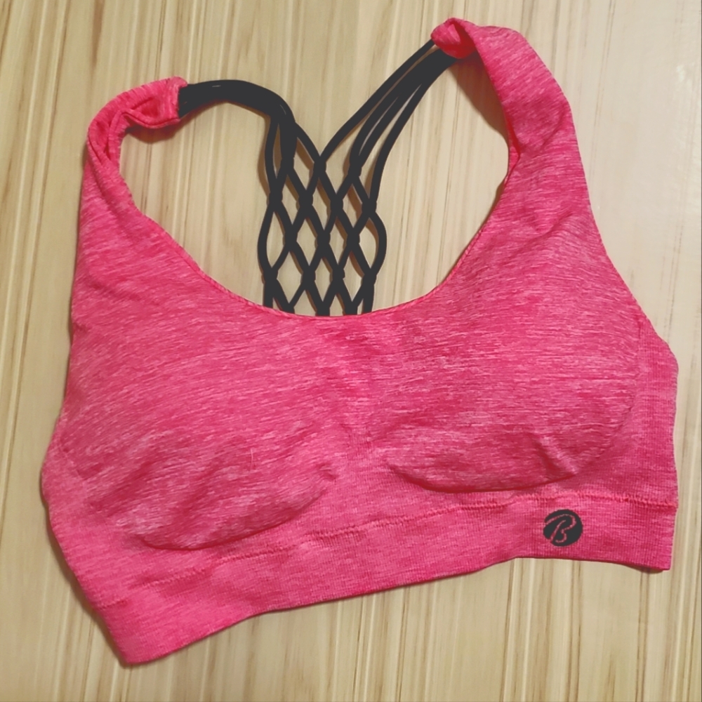 Hot pink strappy sports bra